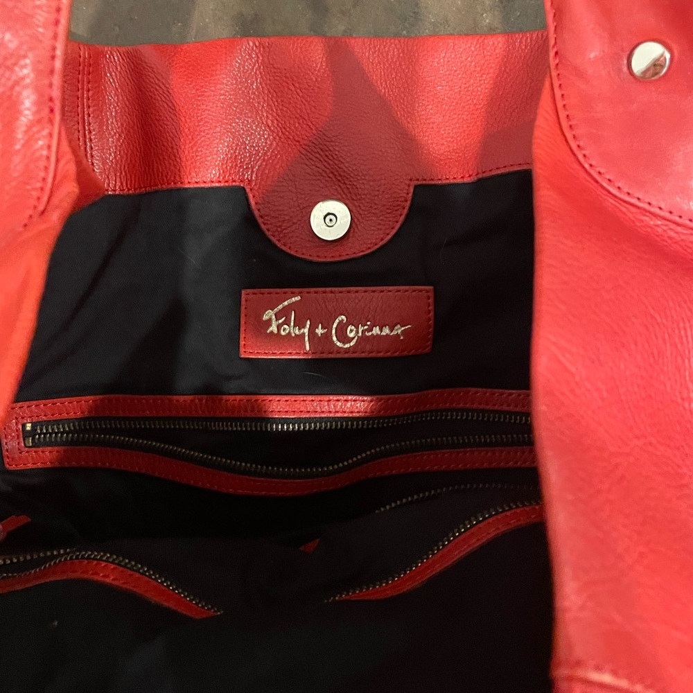 Foley and Corinna red leather purse